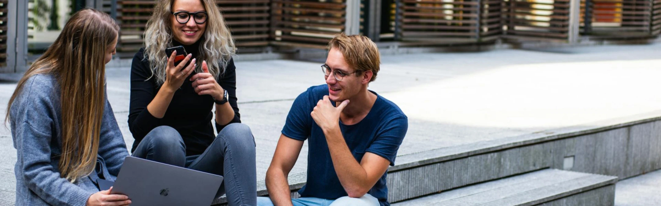 Students interacting with AI-driven learning tools, virtual classrooms, and gamified education platforms, showcasing the future of student engagement through technology